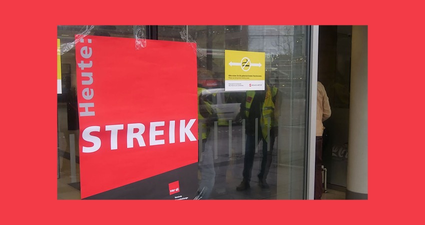 ver.di: Heute Streik im Fenster eines Gebäudes. Foto: Matthias Klump.